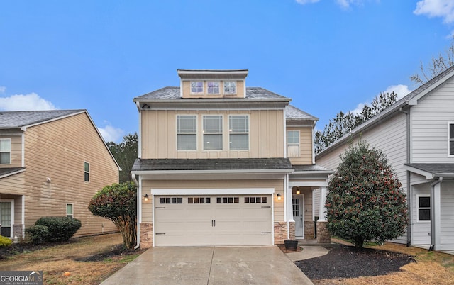 view of front of property with a garage