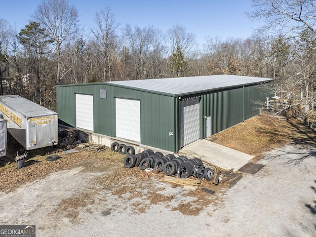 view of outdoor structure with a garage