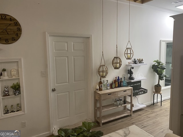 hallway featuring hardwood / wood-style floors