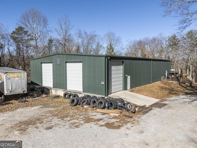 view of outdoor structure with a garage