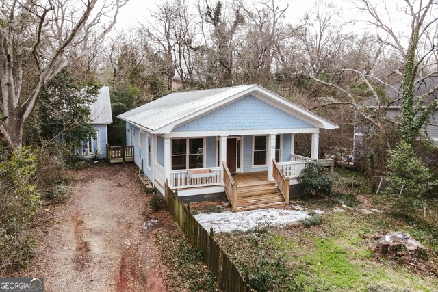 bungalow-style home with a porch