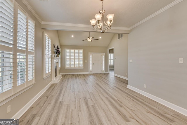 unfurnished room featuring ceiling fan with notable chandelier, vaulted ceiling, ornamental molding, and light wood-type flooring