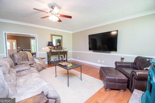 108 Stonebridge Ln, Lagrange, GA 30240 - living area featuring wood finished floors, a ceiling fan, a textured ceiling, and ornamental molding