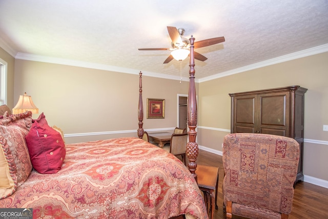 bedroom featuring ornamental molding, dark hardwood / wood-style flooring, a textured ceiling, and ceiling fan