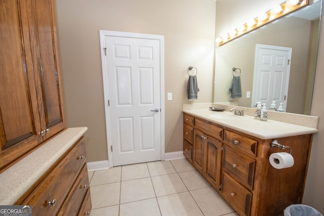 bathroom featuring tile patterned floors and vanity