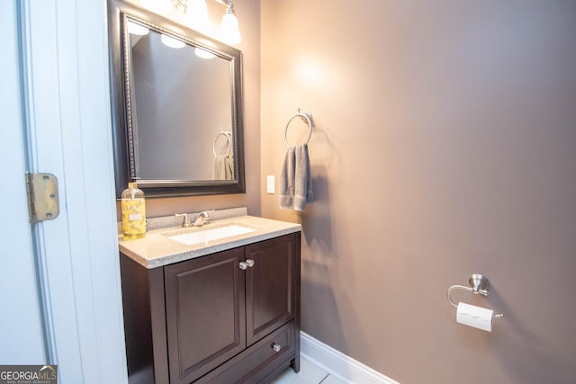 bathroom with vanity and tile patterned floors