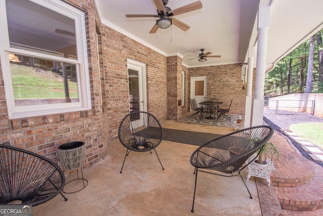 view of patio / terrace featuring ceiling fan