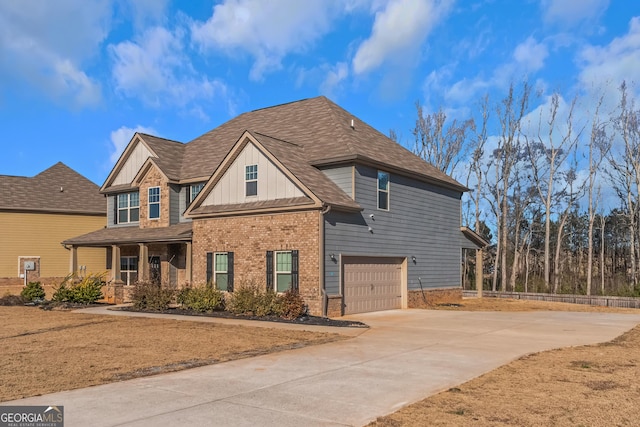 view of front of property with a garage and covered porch