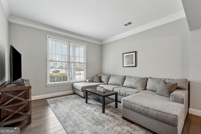 living room featuring crown molding and wood-type flooring