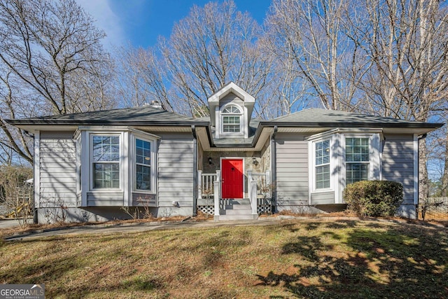 view of front of house with a front lawn