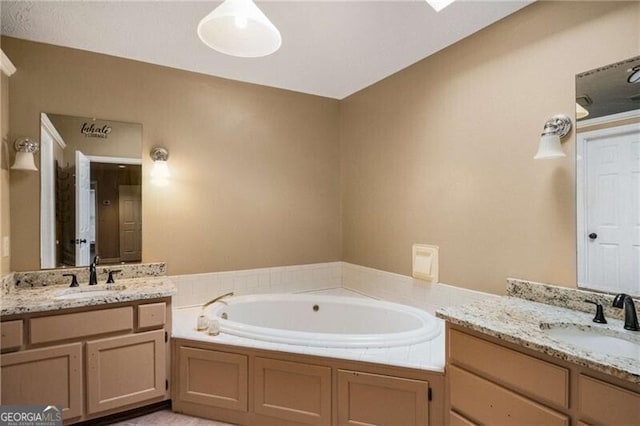 bathroom featuring vanity and a bathtub