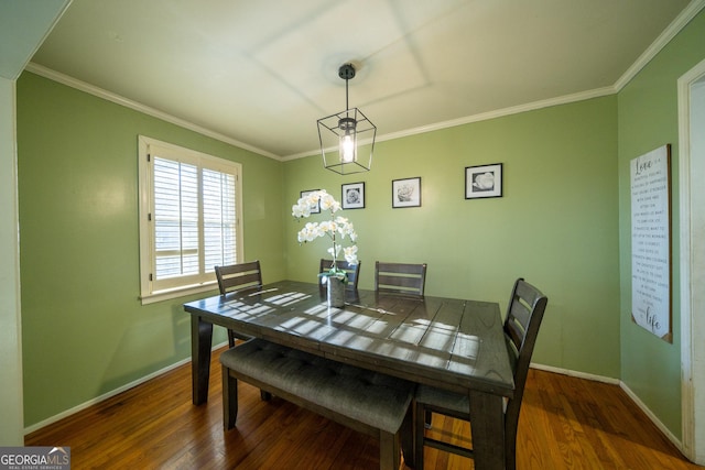 dining space with crown molding and dark wood-type flooring