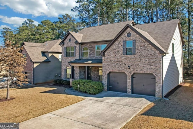 view of front of property with a garage