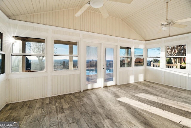 unfurnished sunroom featuring lofted ceiling and ceiling fan