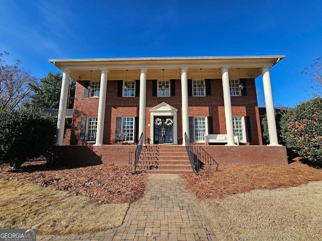 neoclassical home with french doors