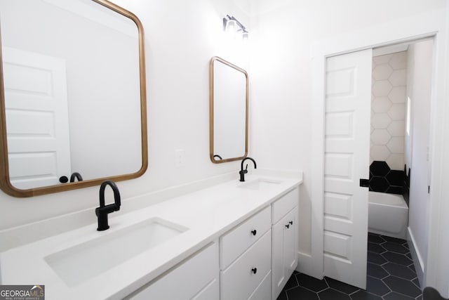 bathroom featuring vanity and tile patterned flooring