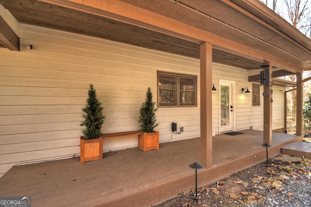 exterior space featuring a wooden deck