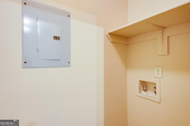 clothes washing area featuring laundry area, washer hookup, and electric panel