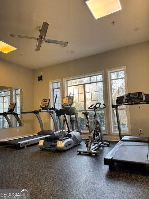 workout area with plenty of natural light and ceiling fan