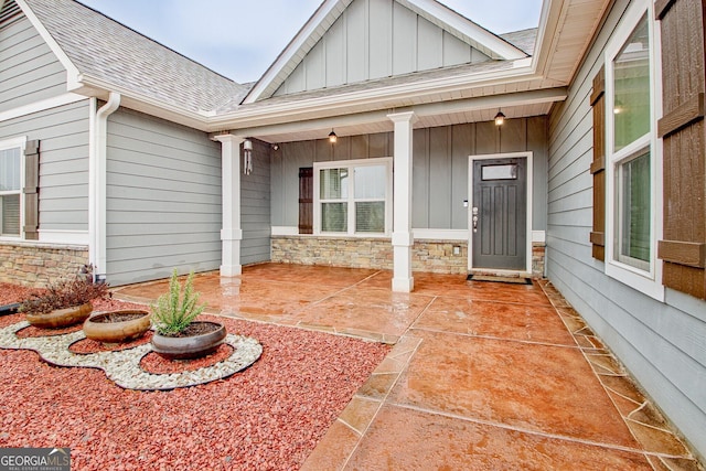 property entrance with covered porch