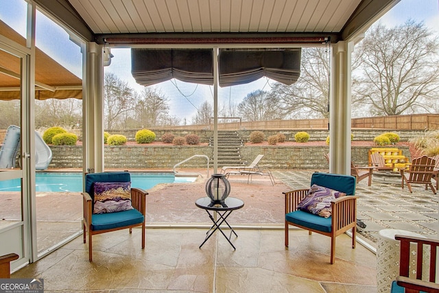 exterior space featuring a fenced in pool