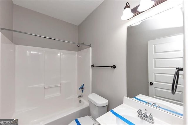 full bathroom featuring vanity, shower / bathtub combination, and toilet