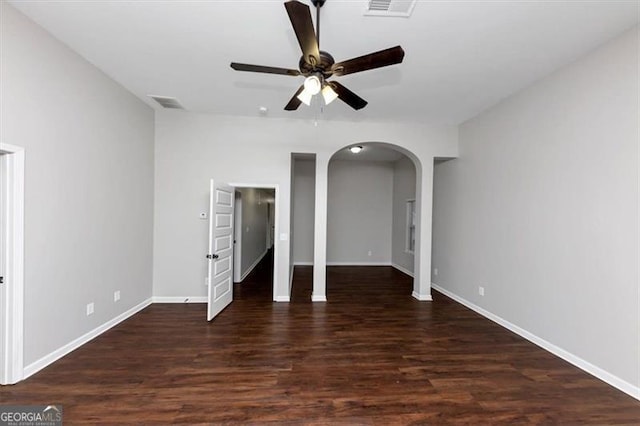 unfurnished bedroom with ceiling fan and dark hardwood / wood-style flooring