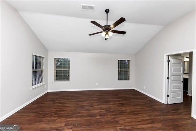 unfurnished room with ceiling fan, dark hardwood / wood-style flooring, and vaulted ceiling