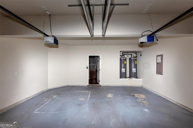 garage featuring a garage door opener, electric panel, and water heater