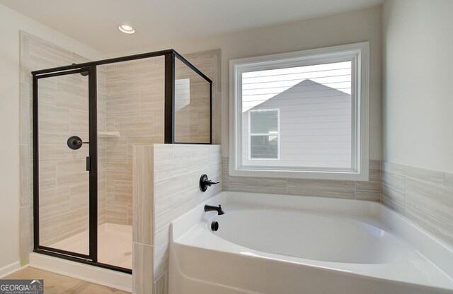 bathroom with plus walk in shower