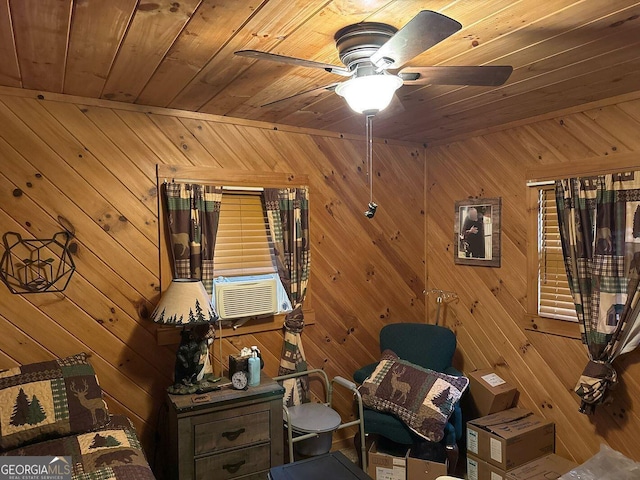 unfurnished room with wood ceiling, ceiling fan, wooden walls, and cooling unit