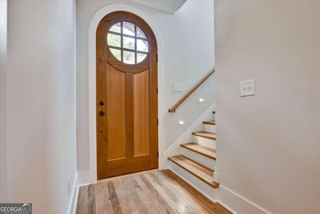 foyer entrance with light wood-type flooring