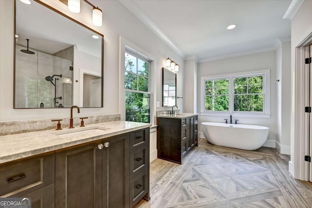 bathroom with crown molding, shower with separate bathtub, and vanity