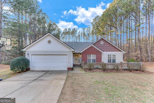 single story home with a garage and a front yard