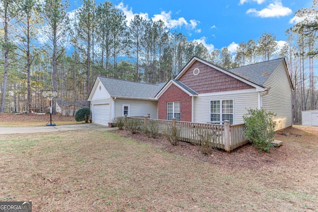 single story home featuring a garage and a front lawn