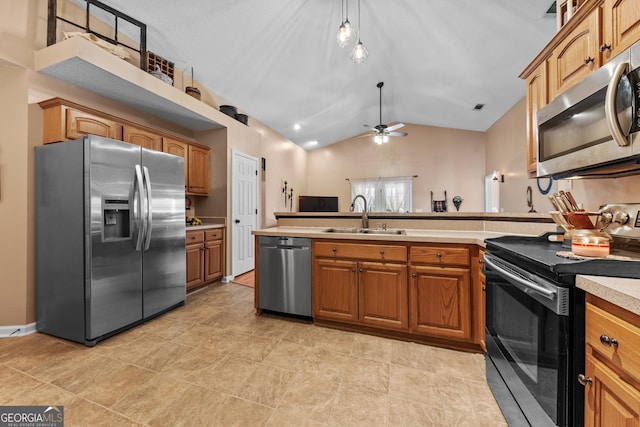 kitchen with vaulted ceiling, sink, hanging light fixtures, ceiling fan, and stainless steel appliances