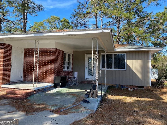 view of front of house with a patio