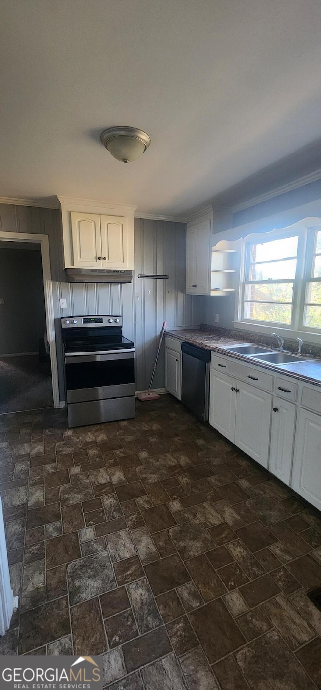 kitchen with crown molding, appliances with stainless steel finishes, sink, and white cabinets