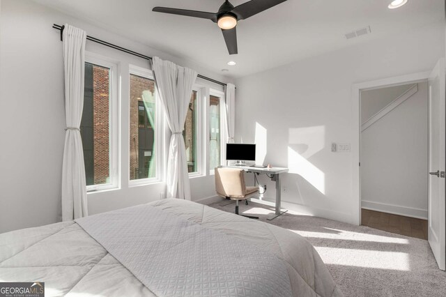 office area featuring dark hardwood / wood-style floors and ceiling fan