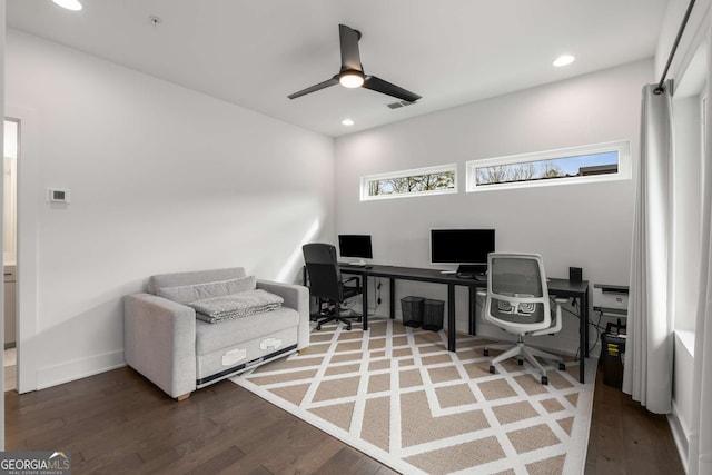 office with hardwood / wood-style flooring and ceiling fan