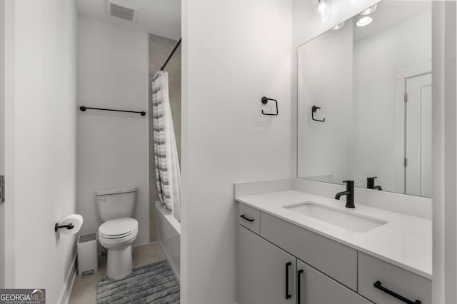 full bathroom with vanity, toilet, tile patterned floors, and shower / bath combo with shower curtain