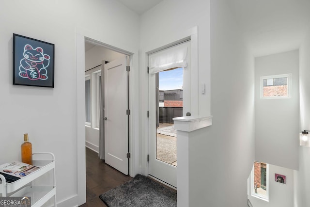 doorway featuring dark hardwood / wood-style floors