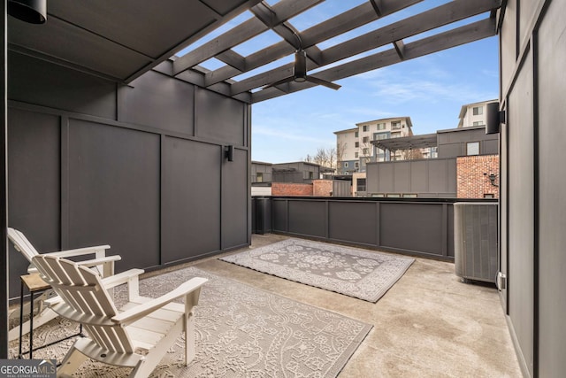 view of patio / terrace with central AC unit and a pergola