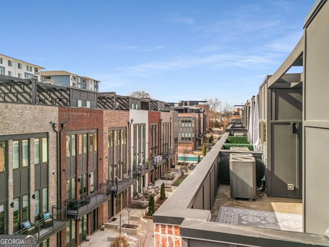 balcony featuring central air condition unit