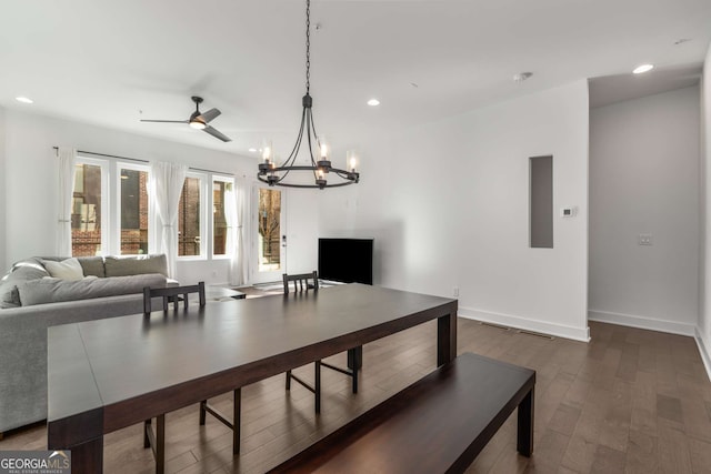 dining room featuring dark hardwood / wood-style flooring and ceiling fan