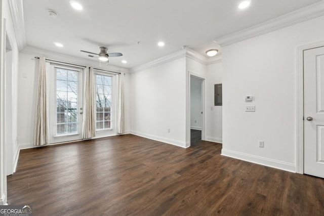 spare room with crown molding, ceiling fan, dark hardwood / wood-style flooring, and electric panel