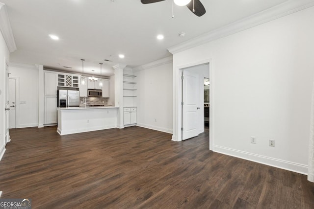 unfurnished living room with crown molding, dark wood-type flooring, and ceiling fan