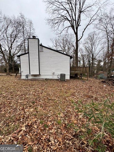 view of property exterior with cooling unit