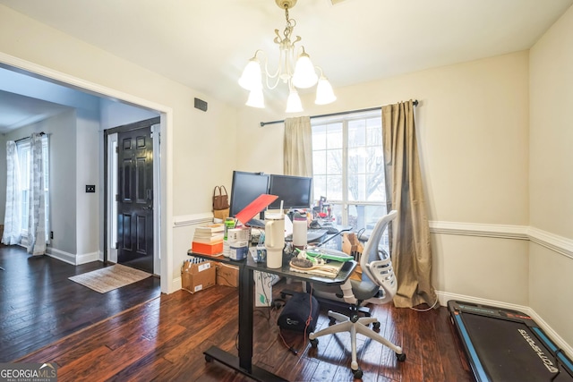 office area featuring dark hardwood / wood-style floors and an inviting chandelier