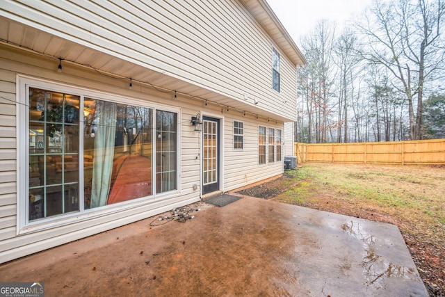 view of patio with central AC unit